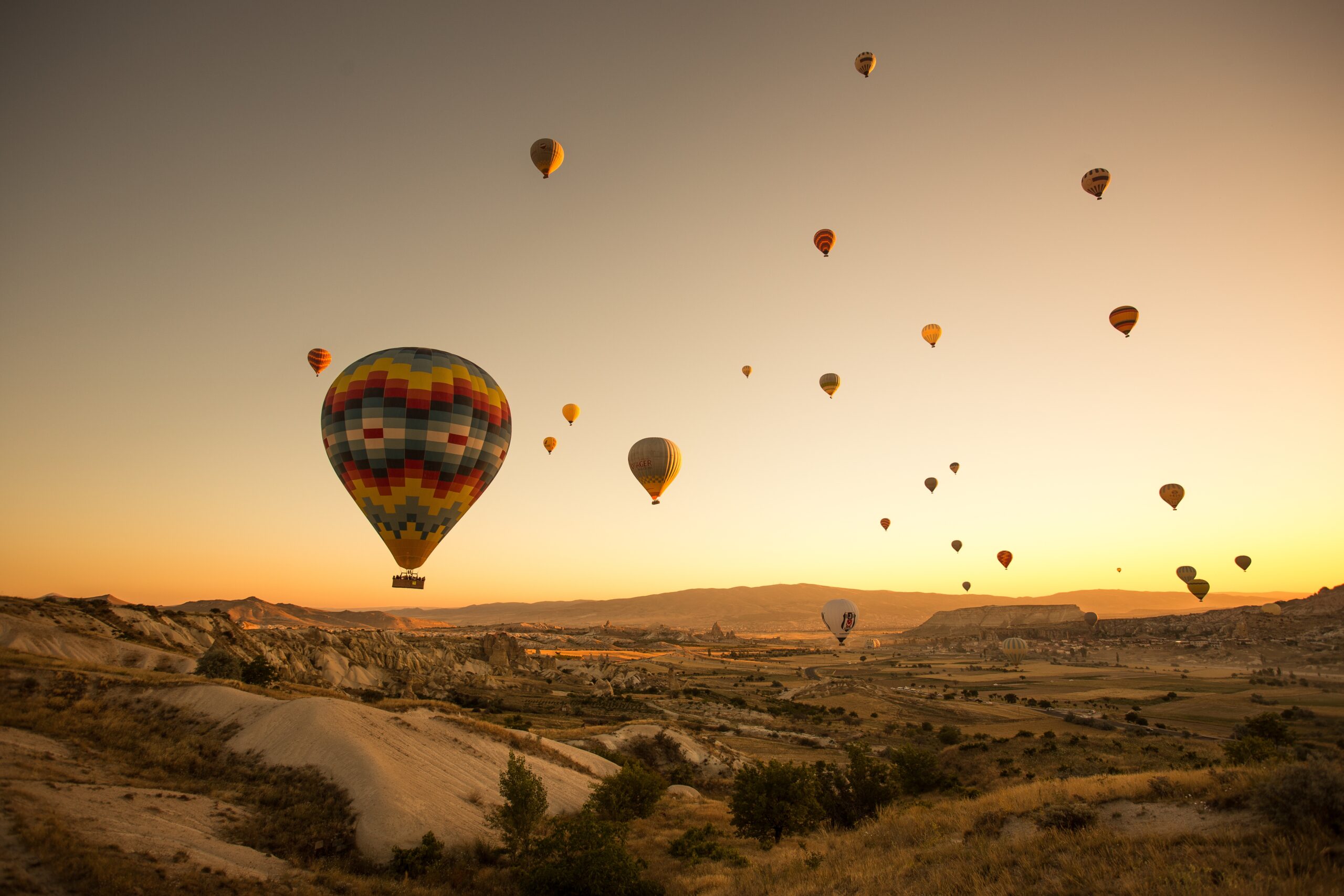 set-colored-balloons-flying-ground-cappadocia-turkey-scaled-1.jpg